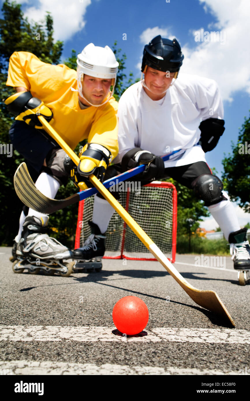 scenes of street hockey match Stock Photo