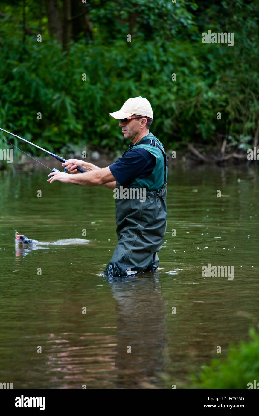 a angler fishing in the river Stock Photo