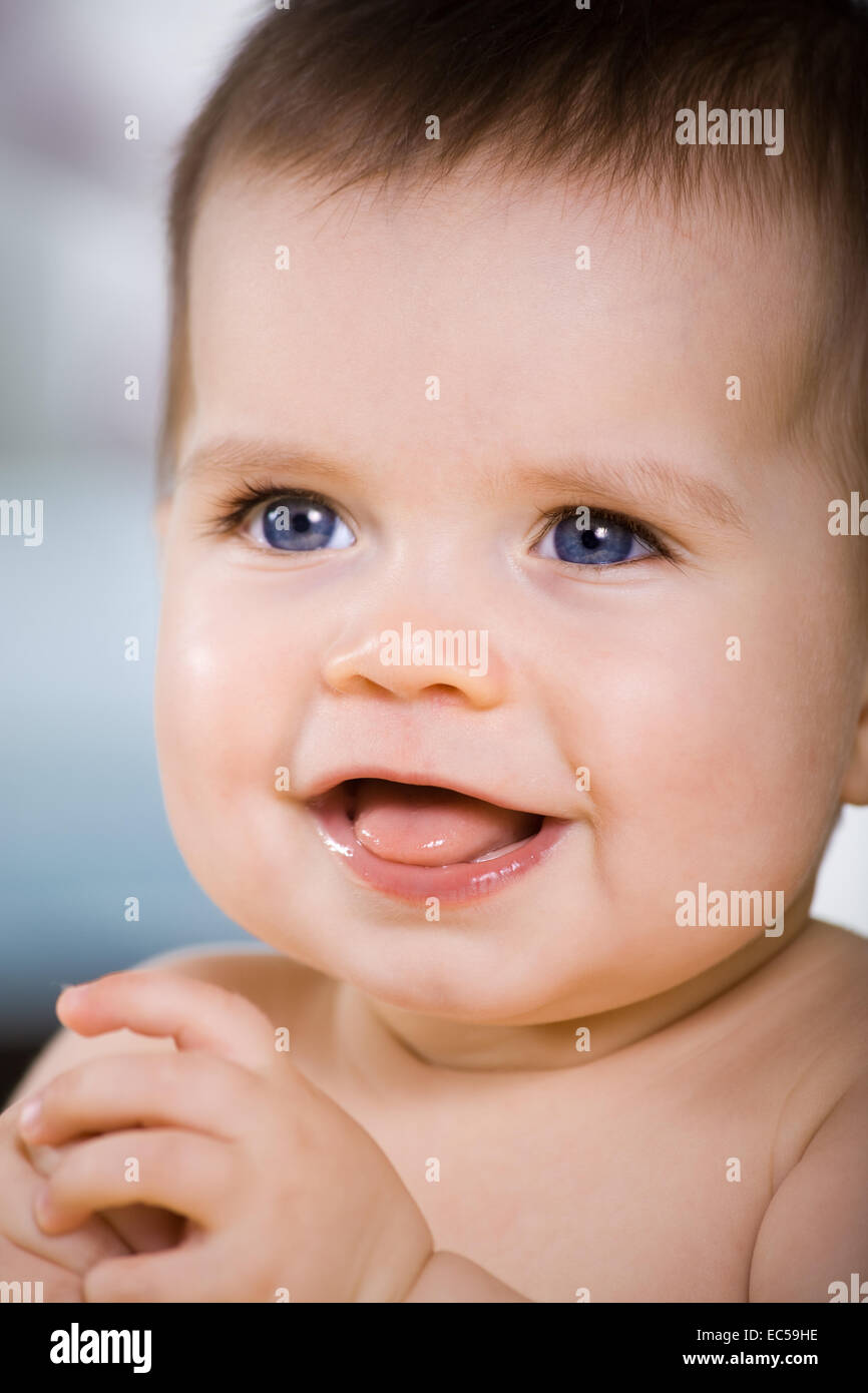 a 6 month old baby in front of nursery Stock Photo Alamy
