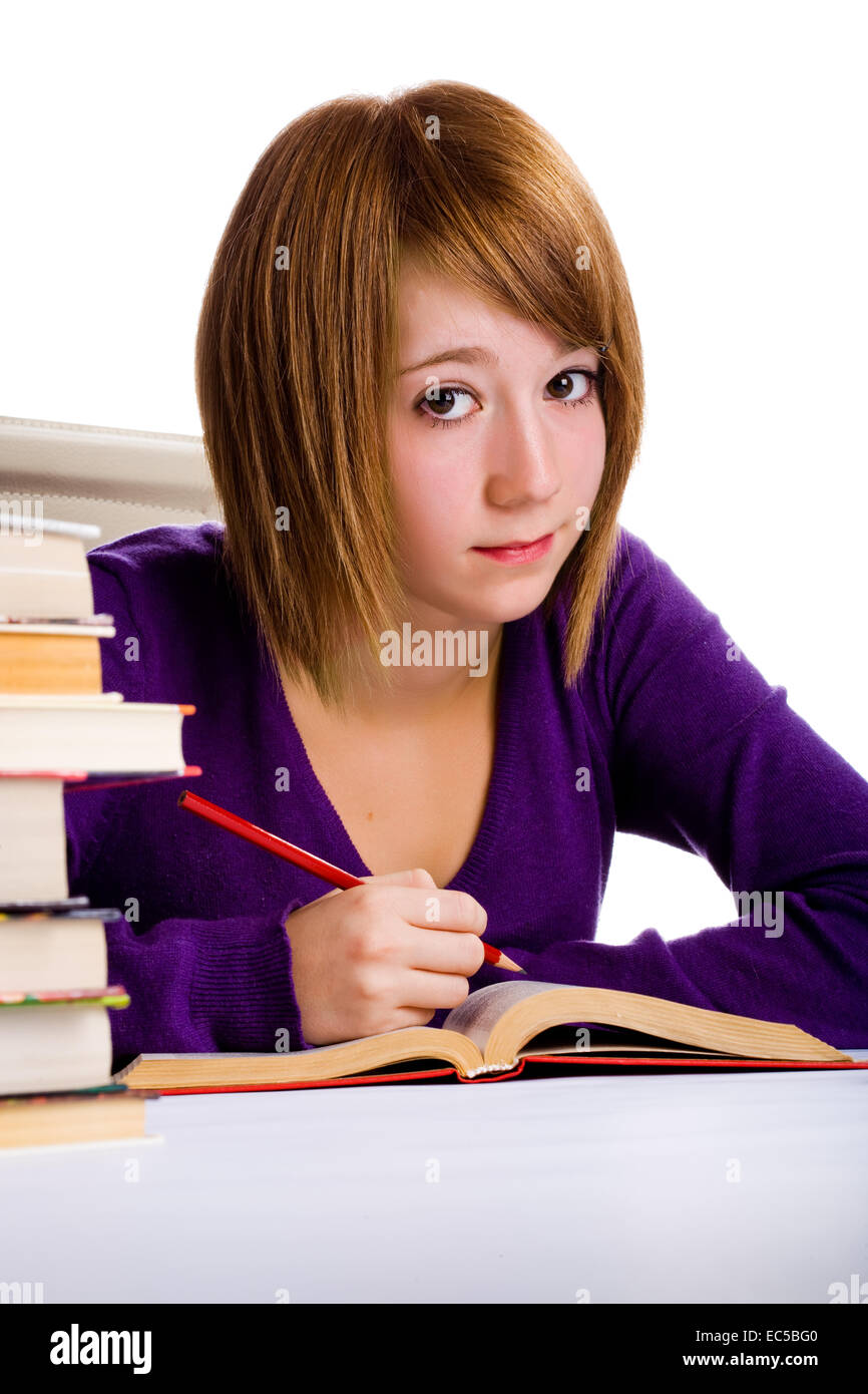 a schoolgirl with abook in front of white background Stock Photo - Alamy