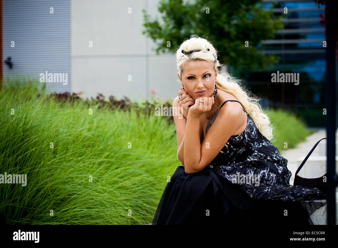 the outdoor portrait of a young woman Stock Photo - Alamy