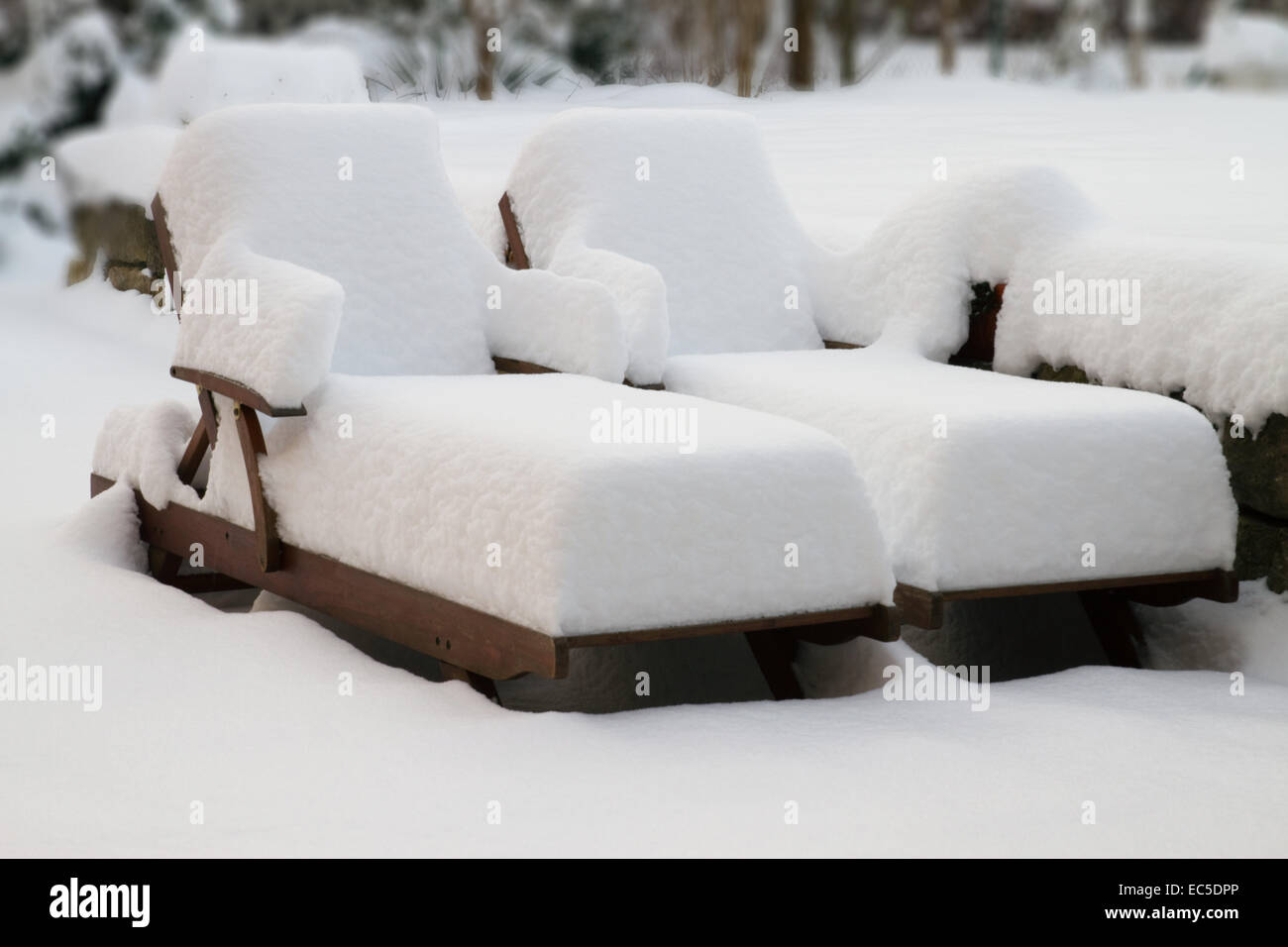 sun beds in snow Stock Photo Alamy