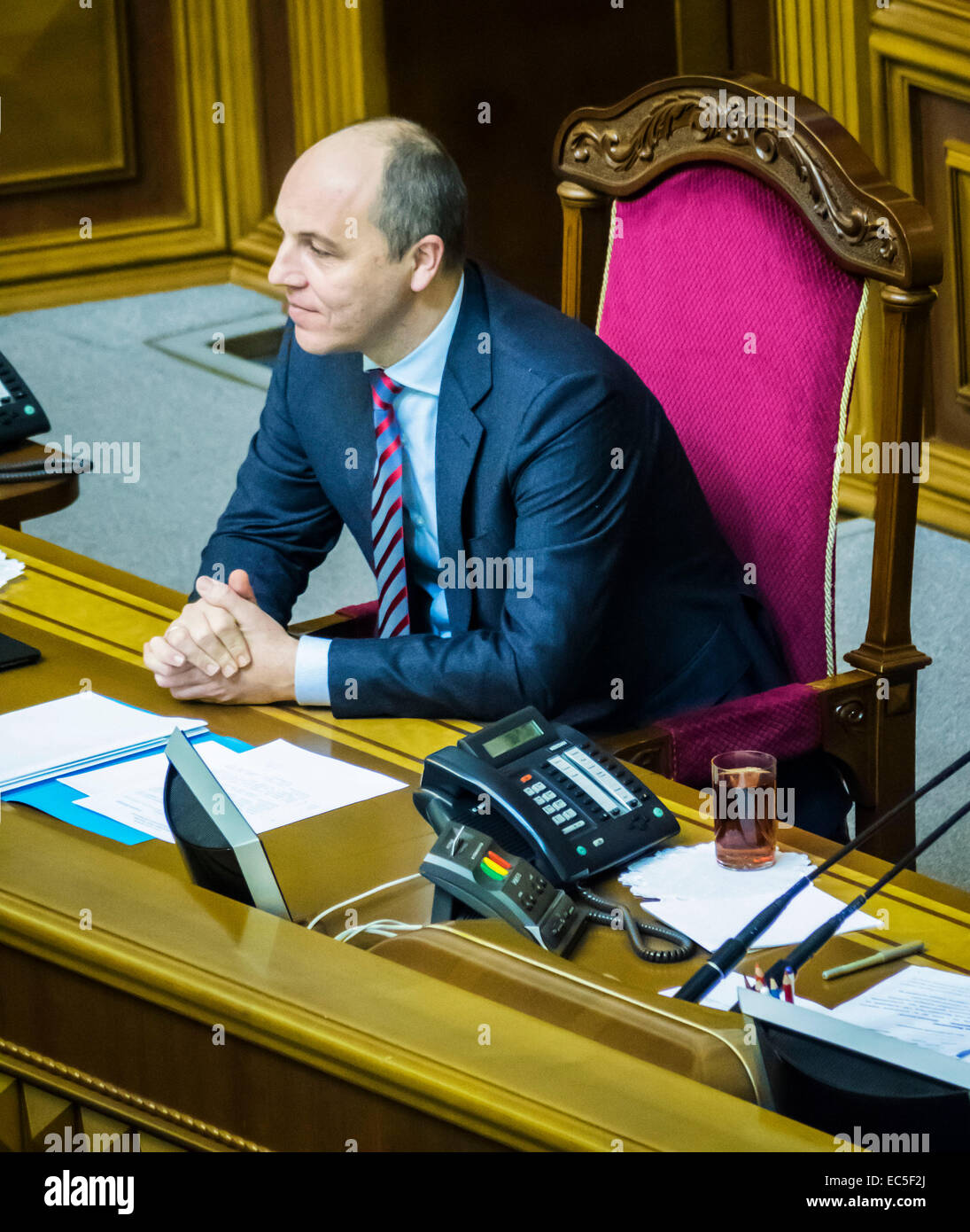 Kiev, Ukraine. 9th December, 2014. Deputy Chairman of the Verkhovna Rada of Ukraine Andriy Paruby --  Oleg Lyashko faction blocked the rostrum demanding an immediate vote a resolution on dismissal of the Chairmanship of the Committee of former members of the Party of Regions, which voted in favor of dictatorial laws of January 16. Oleg Lyashko spoke from the podium: 'It is the law of January 16 led to bloodshed on the Maidan, and for this reason, these members are not eligible to participate in nation-building.' Credit:  Igor Golovnov/Alamy Live News Stock Photo