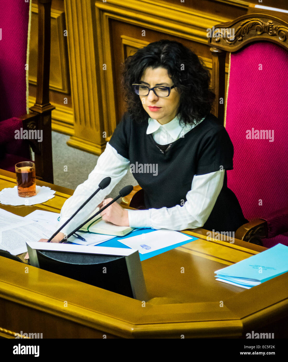 Kiev, Ukraine. 9th December, 2014. Deputy Chairman of the Verkhovna Rada of Ukraine Oksana Syroyid --  Oleg Lyashko faction blocked the rostrum demanding an immediate vote a resolution on dismissal of the Chairmanship of the Committee of former members of the Party of Regions, which voted in favor of dictatorial laws of January 16. Oleg Lyashko spoke from the podium: 'It is the law of January 16 led to bloodshed on the Maidan, and for this reason, these members are not eligible to participate in nation-building.' Credit:  Igor Golovnov/Alamy Live News Stock Photo