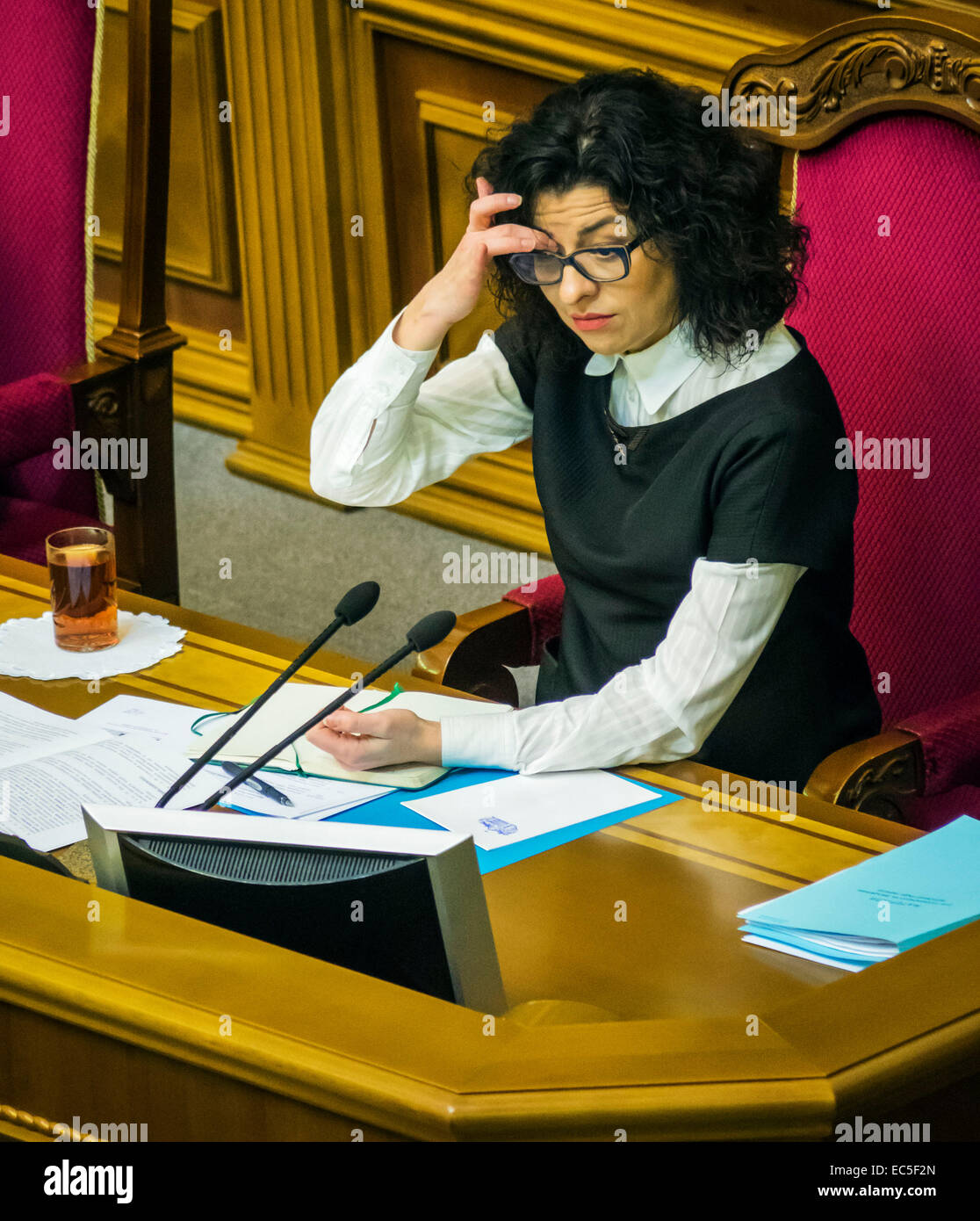 Kiev, Ukraine. 9th December, 2014. Deputy Chairman of the Verkhovna Rada of Ukraine Oksana Syroyid --  Oleg Lyashko faction blocked the rostrum demanding an immediate vote a resolution on dismissal of the Chairmanship of the Committee of former members of the Party of Regions, which voted in favor of dictatorial laws of January 16. Oleg Lyashko spoke from the podium: 'It is the law of January 16 led to bloodshed on the Maidan, and for this reason, these members are not eligible to participate in nation-building.' Credit:  Igor Golovnov/Alamy Live News Stock Photo
