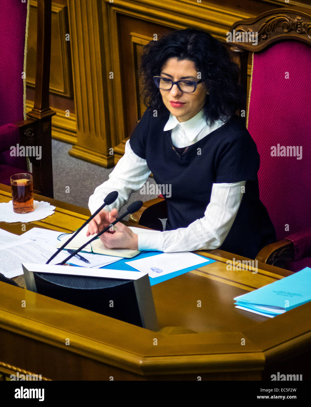 Kiev, Ukraine. 9th December, 2014. Deputy Chairman of the Verkhovna Rada of Ukraine Oksana Syroyid --  Oleg Lyashko faction blocked the rostrum demanding an immediate vote a resolution on dismissal of the Chairmanship of the Committee of former members of the Party of Regions, which voted in favor of dictatorial laws of January 16. Oleg Lyashko spoke from the podium: 'It is the law of January 16 led to bloodshed on the Maidan, and for this reason, these members are not eligible to participate in nation-building.' Credit:  Igor Golovnov/Alamy Live News Stock Photo
