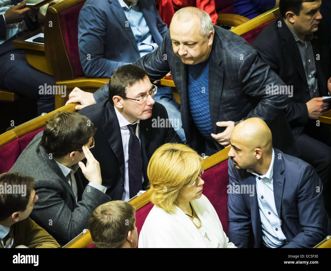 Dec. 9, 2014 - The head of the Bloc Poroshenko in Parliament Yuriy Lutsenko speaks with deputy journalist Mustafa Naem -- On Tuesday, December 9, 2104 in Kiev, Ukraine, Oleg Lyashko faction blocked the rostrum demanding an immediate vote a resolution on dismissal of the Chairmanship of the Committee of former members of the Party of Regions, which voted in favor of dictatorial laws of January 16.Oleg Lyashko spoke from the podium: ''It is the law of January 16 led to bloodshed on the Maidan, and for this reason, these members are not eligible to participate in nation-building. (Credit Image: Stock Photo