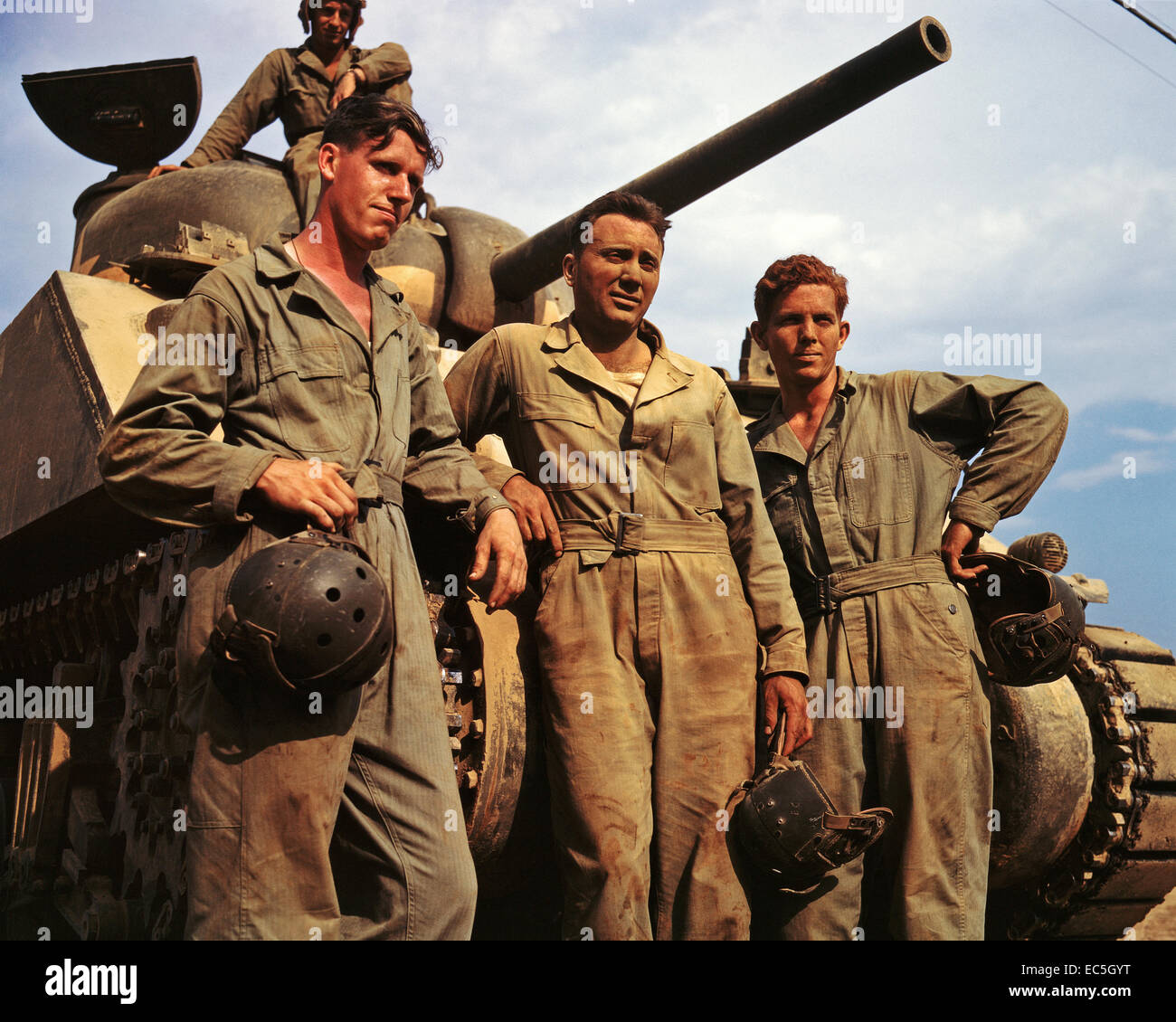 Tank crew standing in front of an M-4 tank, Ft. Knox, Ky. June, 1942. Photograph By Alfred T.Palmer / Office of War Information. Stock Photo