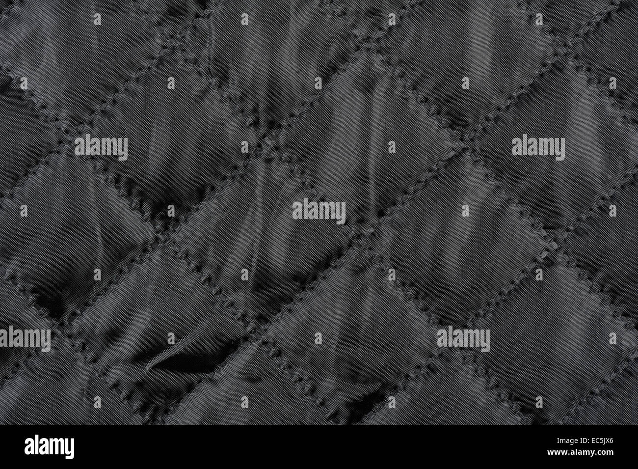 Black quilted cloth texture abstract Stock Photo