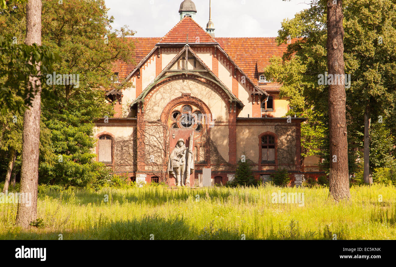 An old almost ruined building is standing in a forest Stock Photo - Alamy