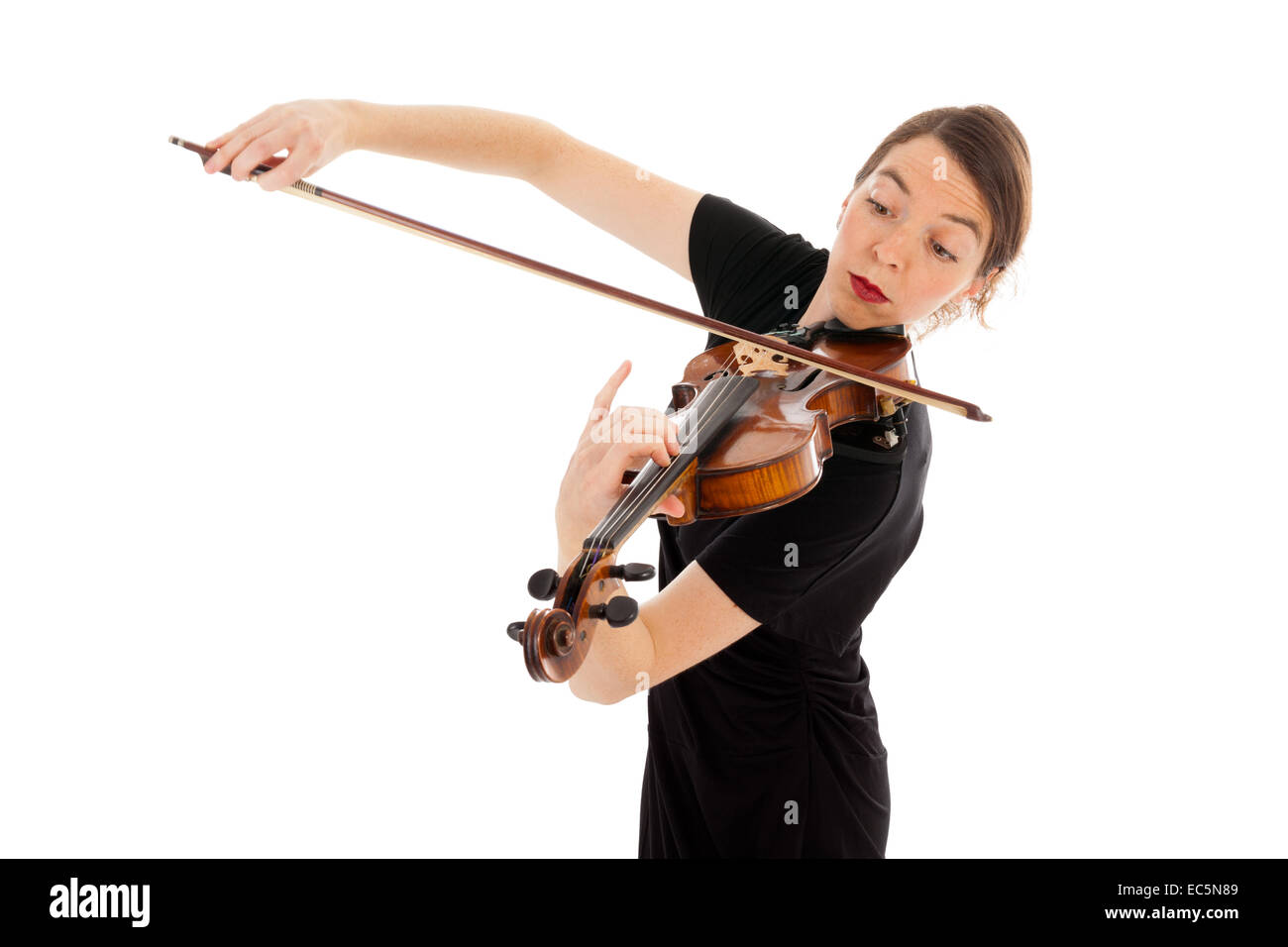 The beautiful young woman is playing the violin Stock Photo - Alamy