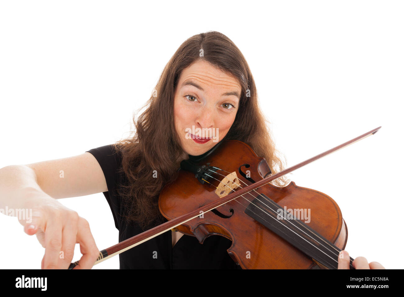 The beautiful young woman is playing the violin Stock Photo - Alamy