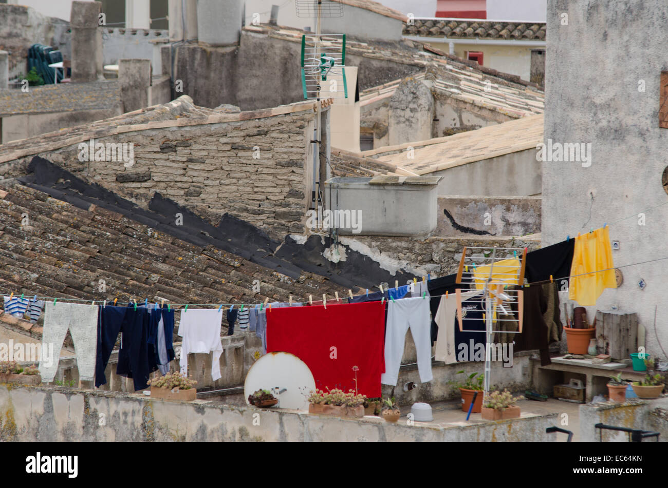 Laundry on a line in a Spanish town Stock Photo Alamy