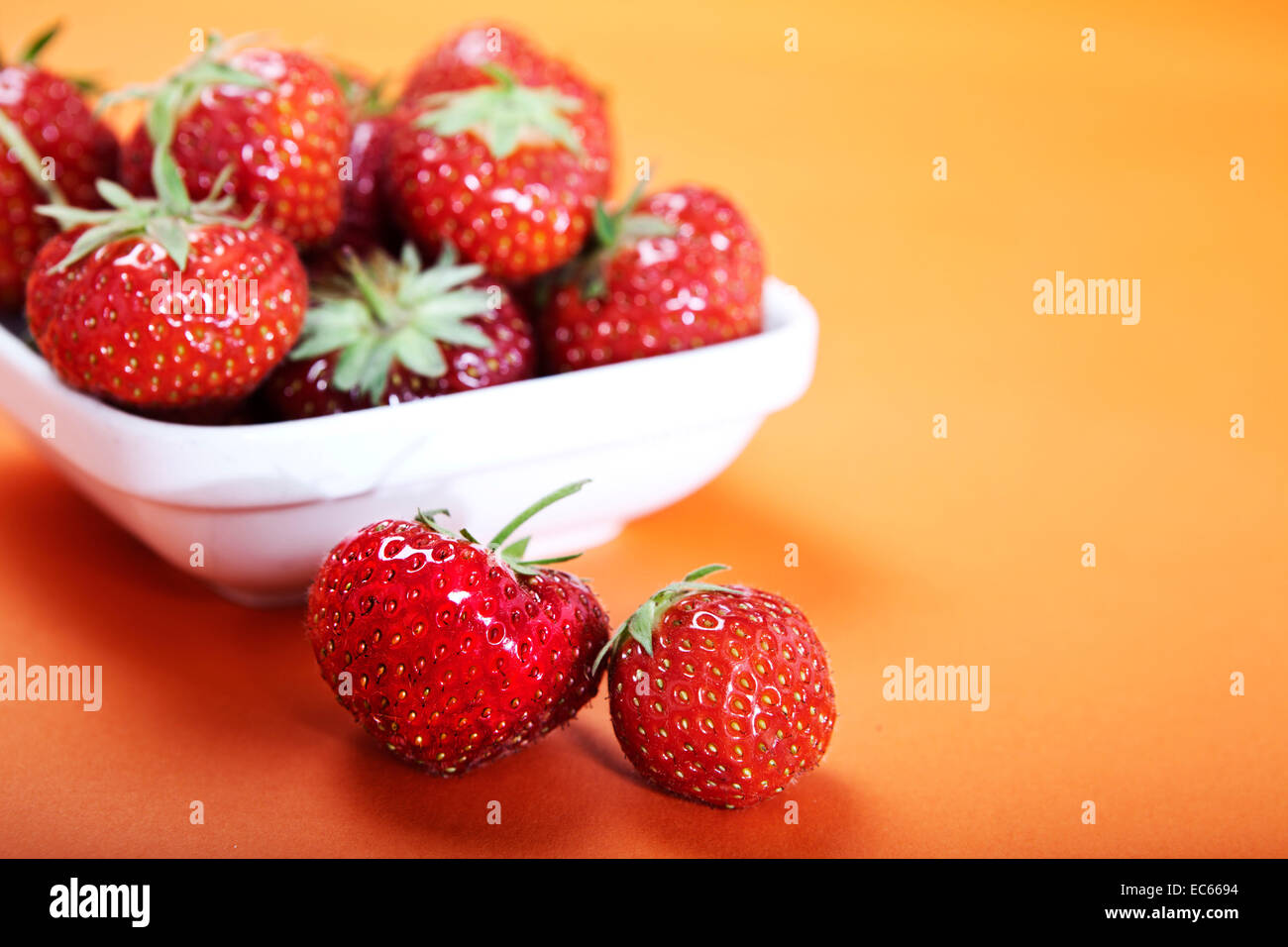 Strawberries in a porcelain dish Stock Photo