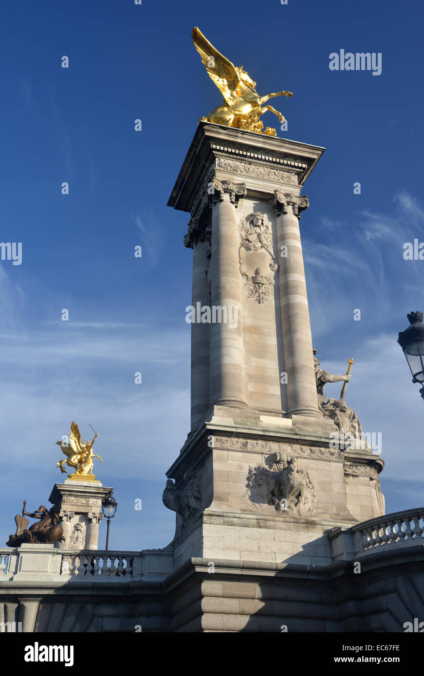 Gilded Fames on top of 17m Plinths at the end of the Pont Alexandre III in Paris, which counterweight the bridge arches Stock Photo