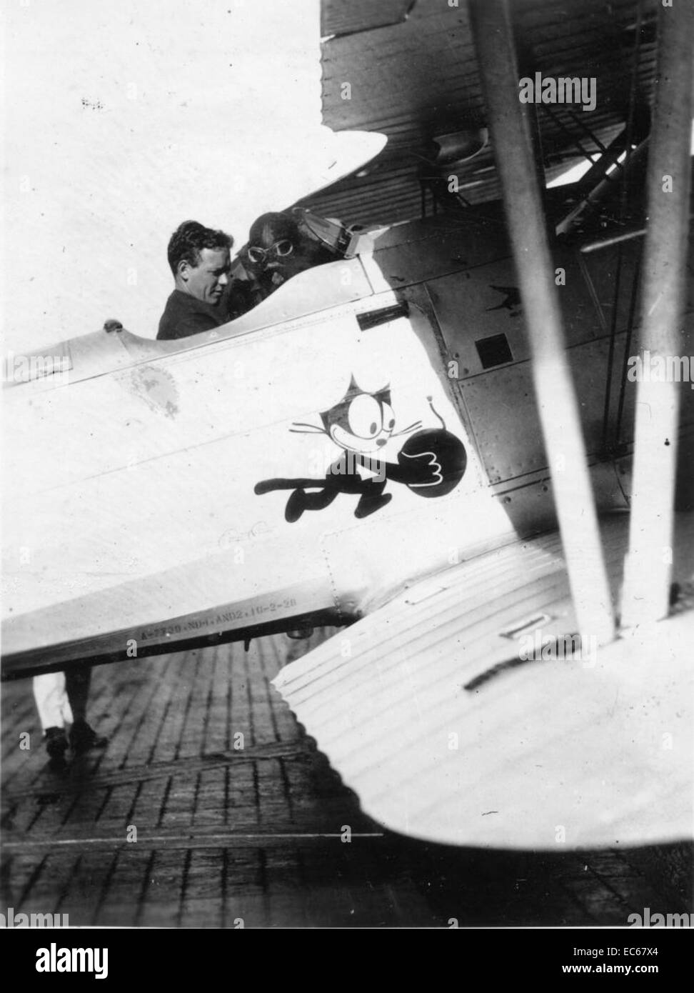 This iconic photograph captures Charles Lindbergh, the first person to ...