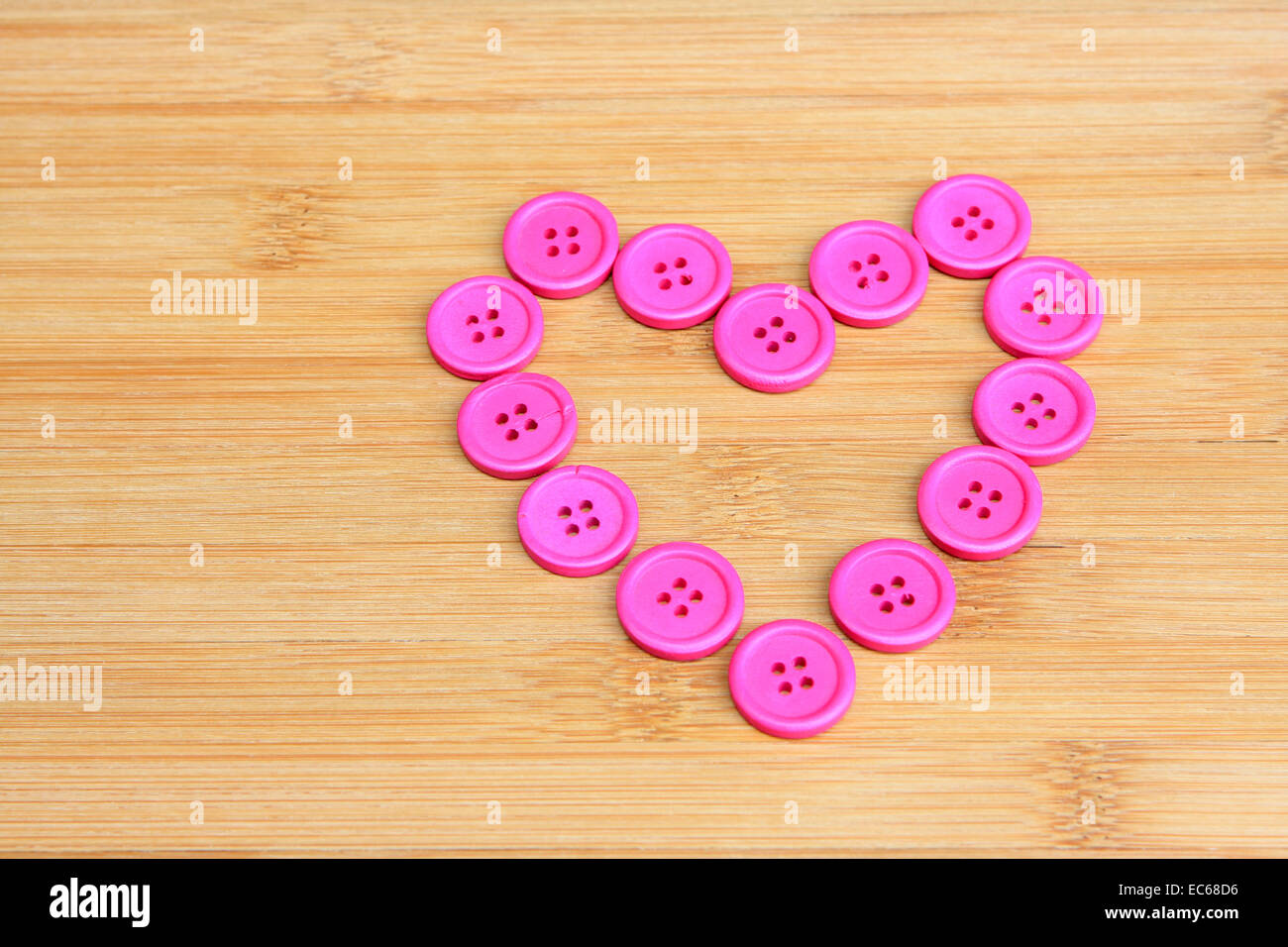 Two heart shaped buttons Stock Photo by ©koosen 35647685