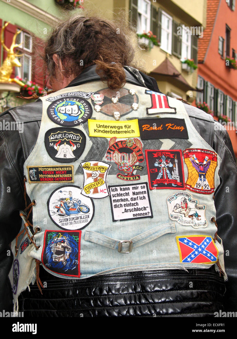 Leather jacket with patches Stock Photo - Alamy