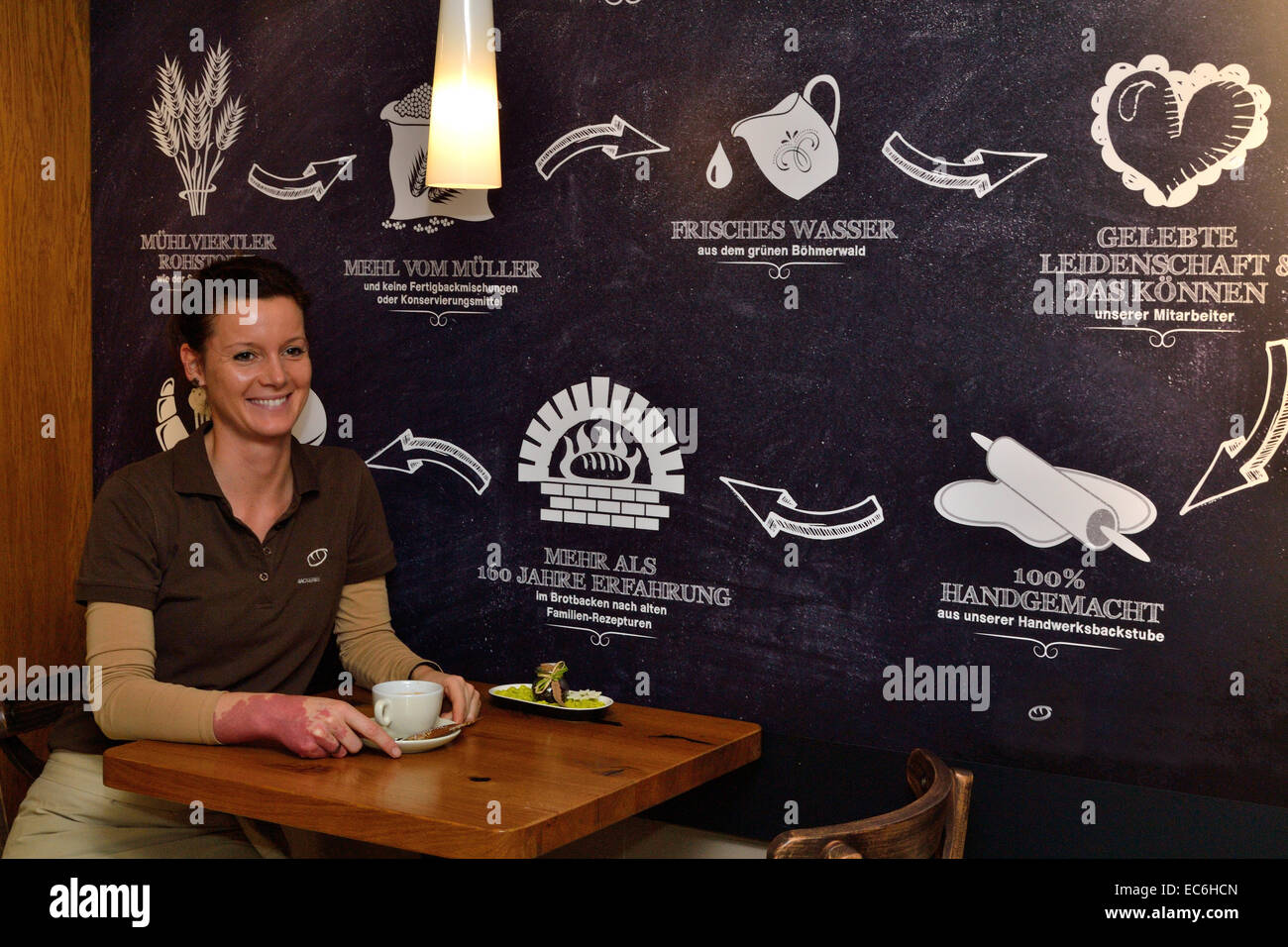 young woman relaxes with cup of coffee Stock Photo - Alamy