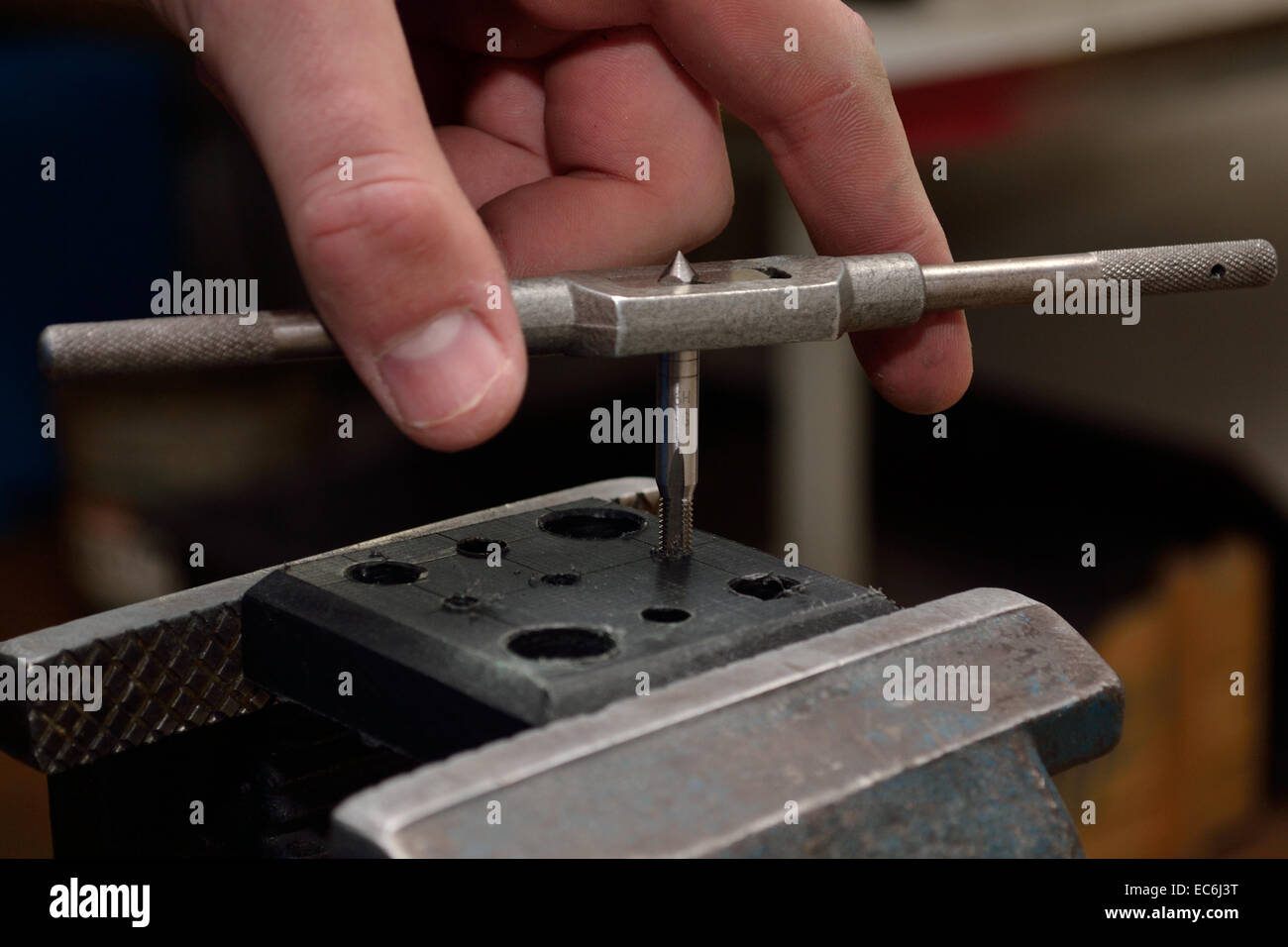 Person cuts in plastic plate thread Stock Photo Alamy