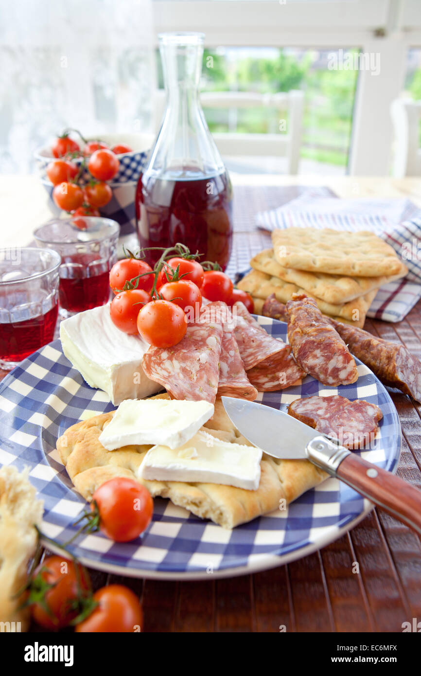 Cheese, salami and flat bread Stock Photo Alamy