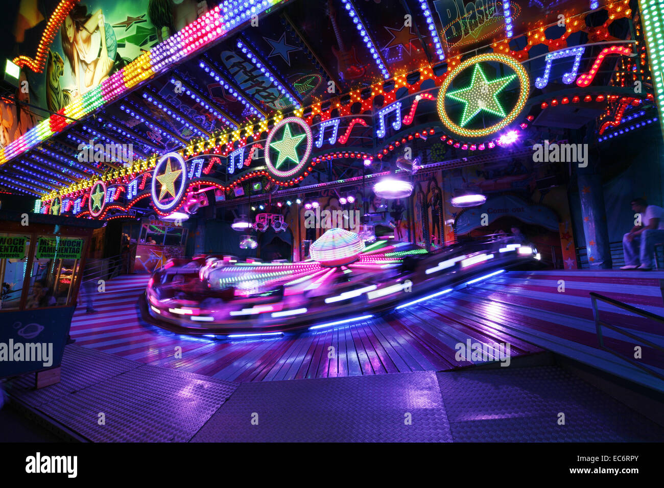 ride carousel fairs carnivals festival light strips in the evening