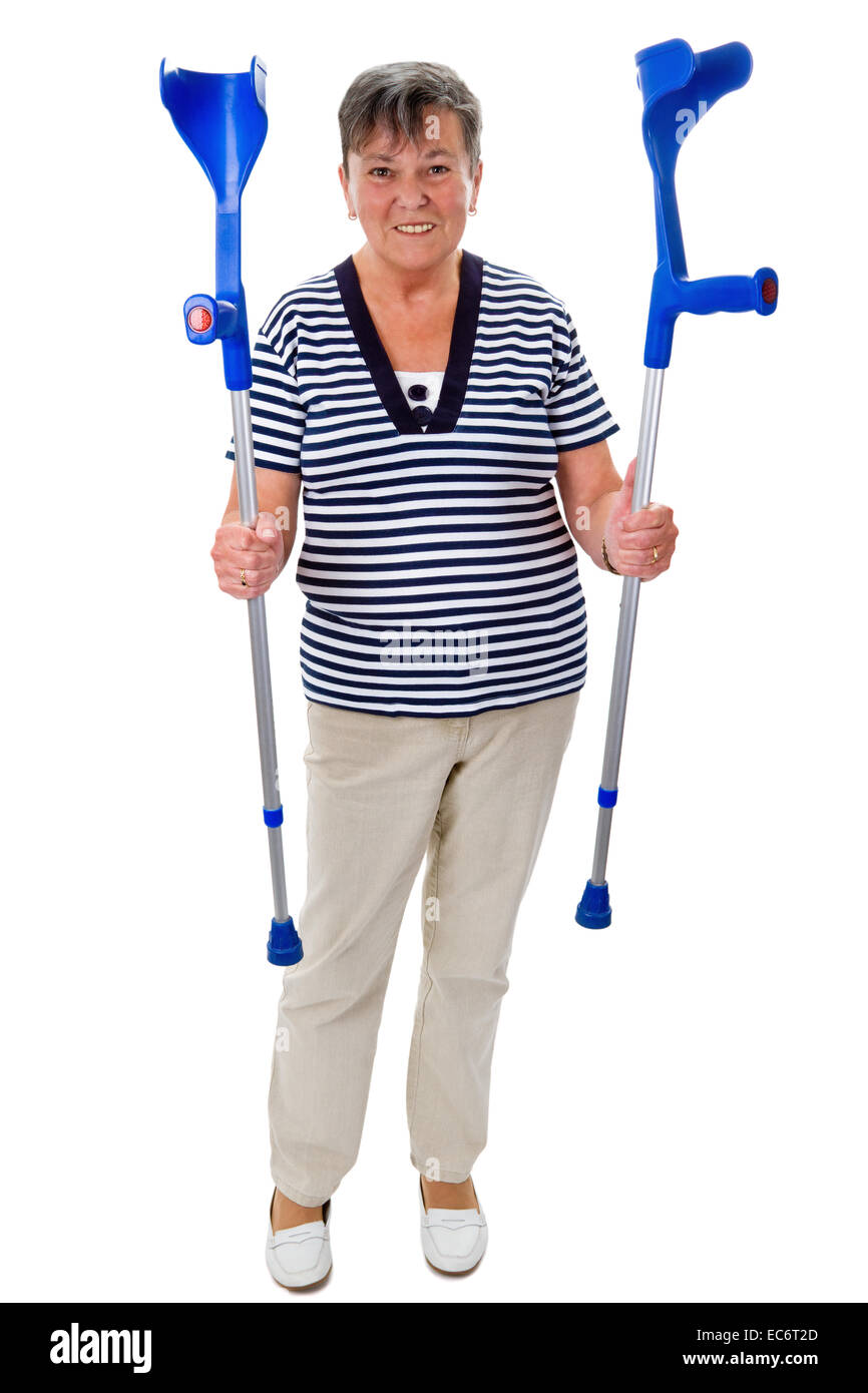 Seniorin with crutches Stock Photo
