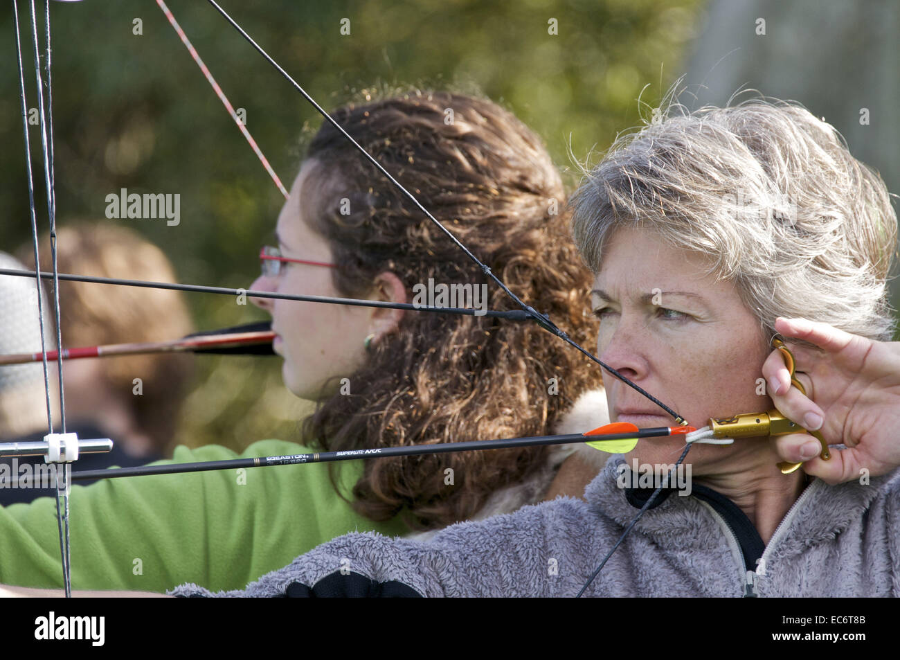 two 2 female archers Stock Photo