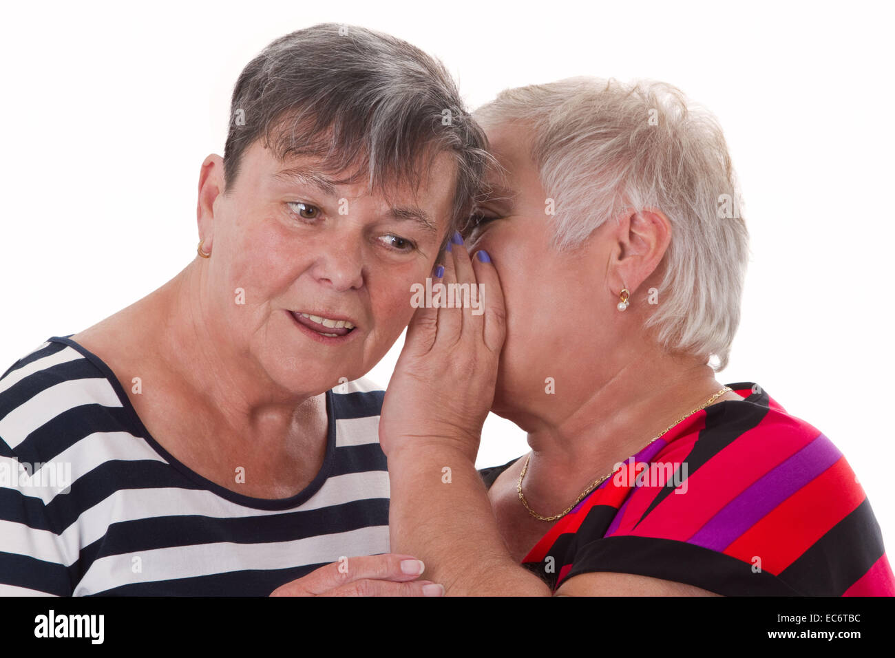 Two elderly women talking gossip hi-res stock photography and images ...