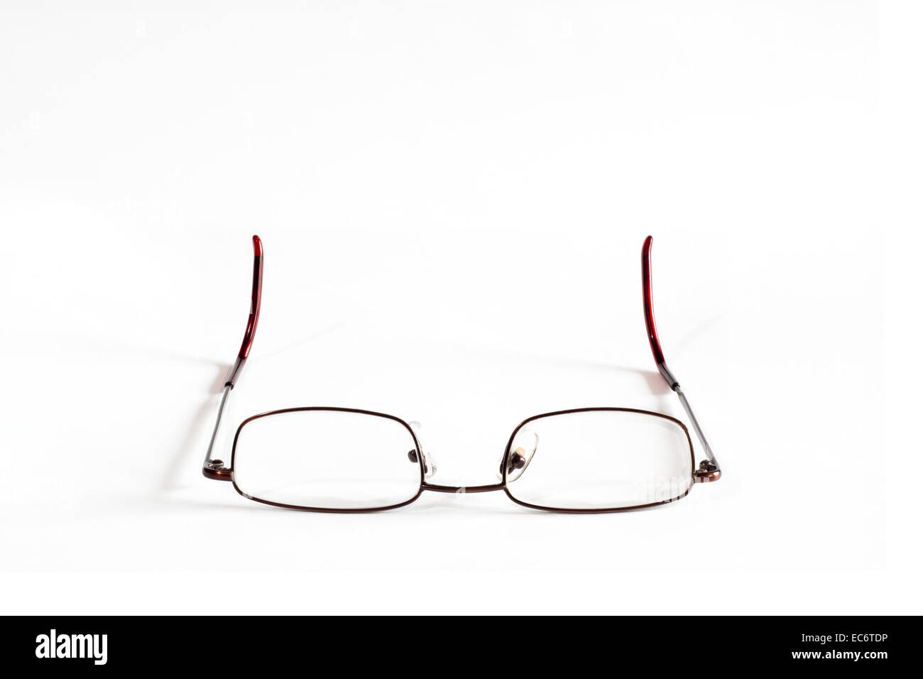 Generic reading glasses on white background Stock Photo