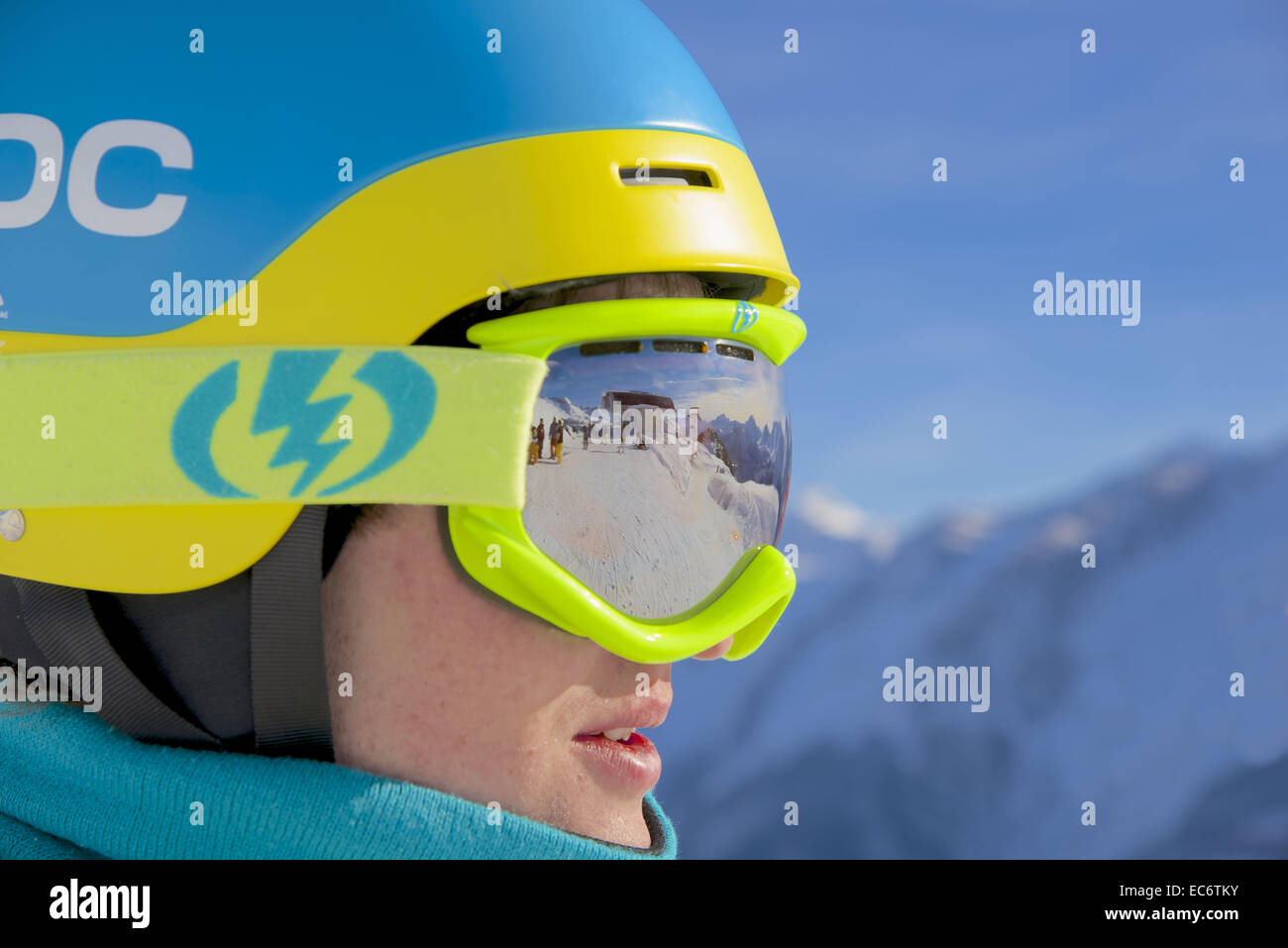 freeskier with helmet and ski goggles reflecting the panorama Stock Photo