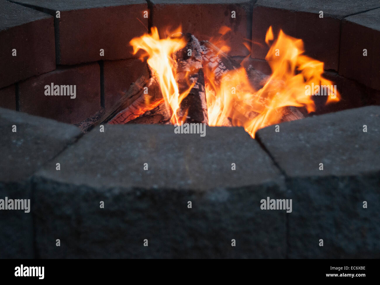 A campfire in a fire pit Stock Photo - Alamy