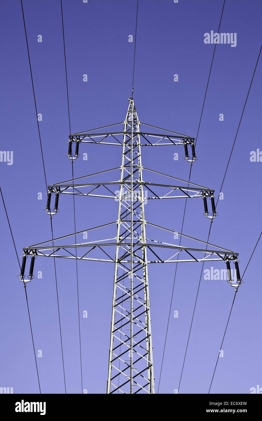 Powerline against blue sky, vertical format Stock Photo