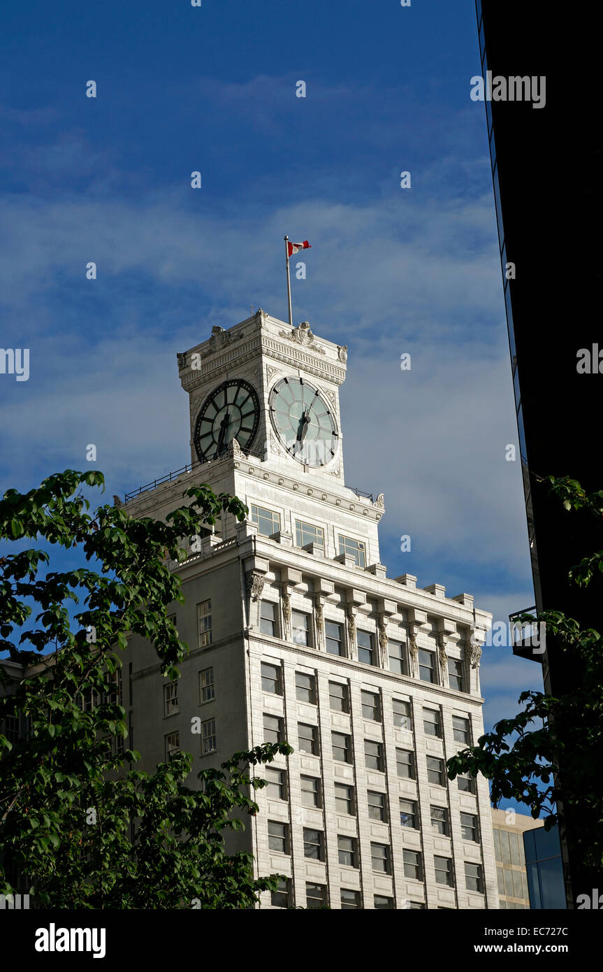 The Vancouver Block building and neon clock tower on Granville Street