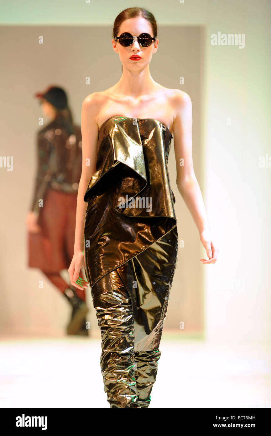 Fashion model wearing a Fyodor Golan design on the Olympus catwalk ...