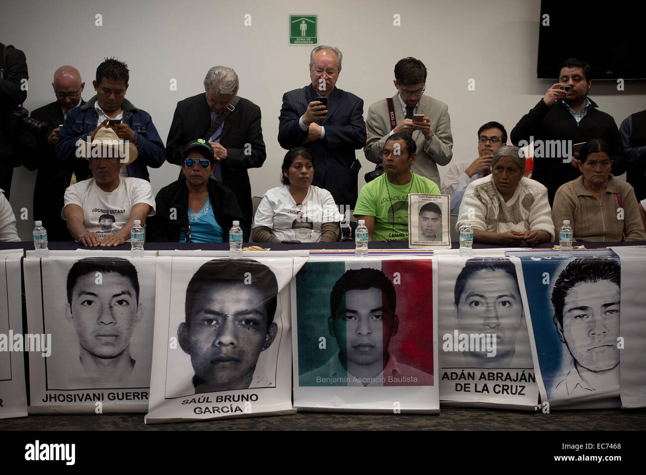 Mexico City, Mexico. 9th Dec, 2014. Family members of the students of the Normal Rural School of Ayotzinapa that went missing in Iguala, Guerrero, take part in a meeting in the Republic's Senate, in Mexico City, capital of Mexico, on Dec. 9, 2014. According to local press, the family members, through a document, asked the Senate to demand the federal authorities to accelerate the investigation of the search of their offspring. © Alejandro Ayala/Xinhua/Alamy Live News Stock Photo