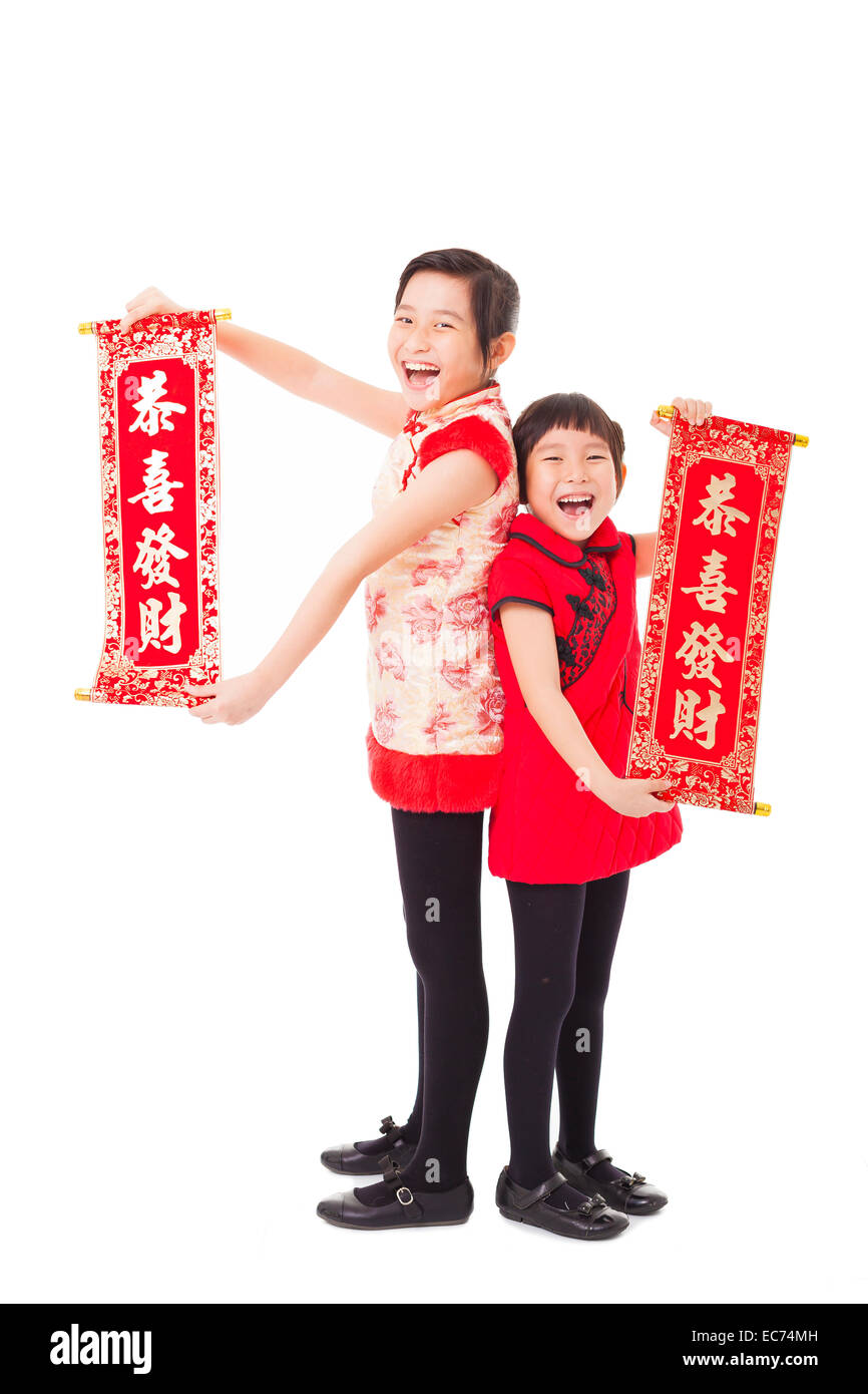 asian little girls showing couplets for happy chinese new year Stock Photo