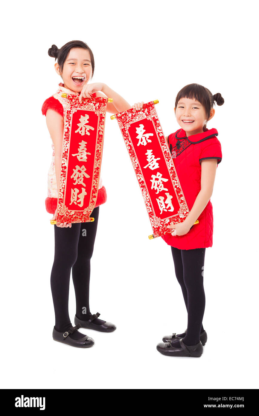asian little girls showing couplets for happy chinese new year Stock Photo