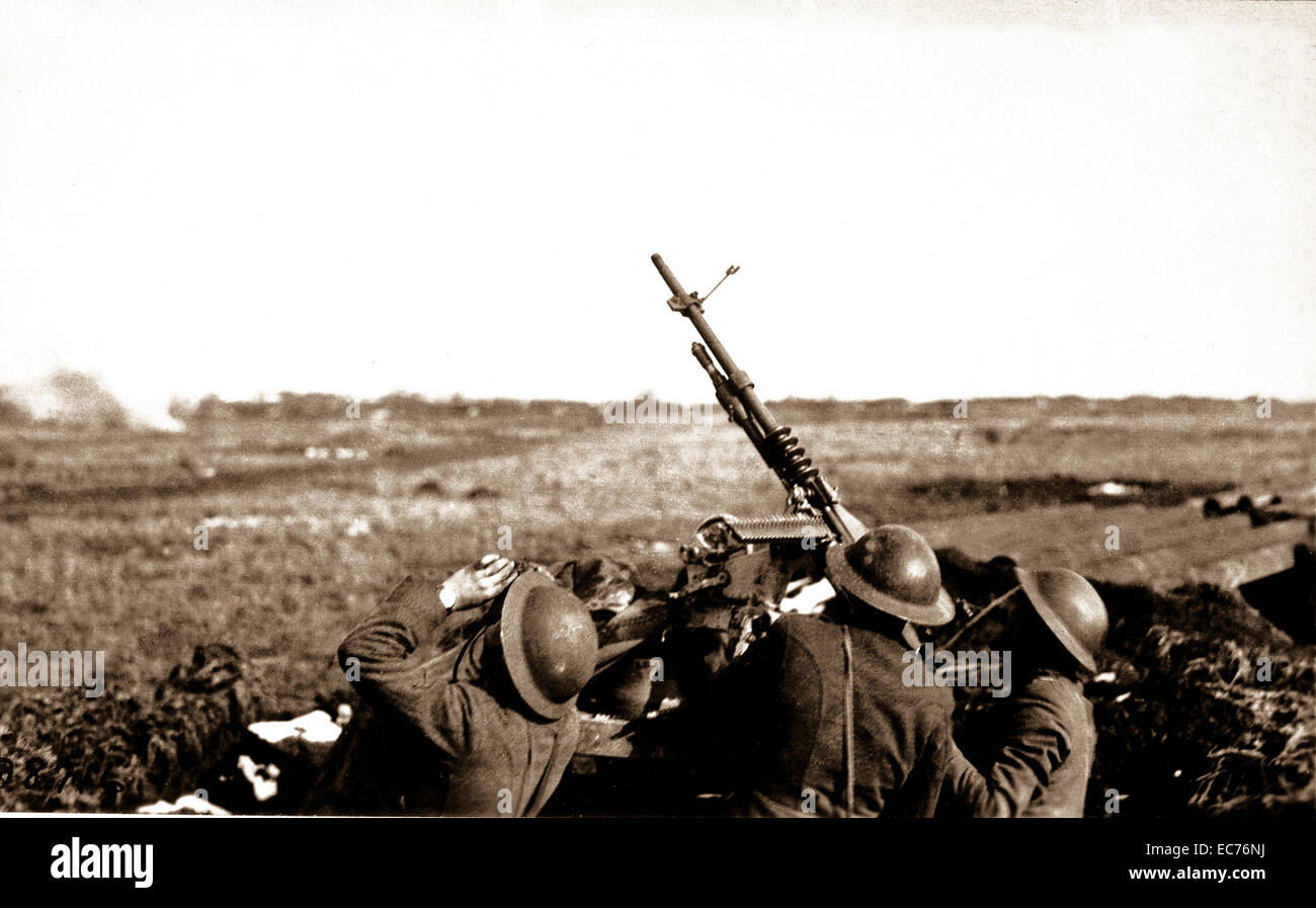 Anti-aircraft machine gun of 101st Field Artillery (formerly 1st Massachusetts F.A., New England Coast Artillery), firing on a German observation plane at Plateau Chemin des Dames, France.  March 5, 1918.  Lt. Edwin H. Cooper. (Army) Stock Photo