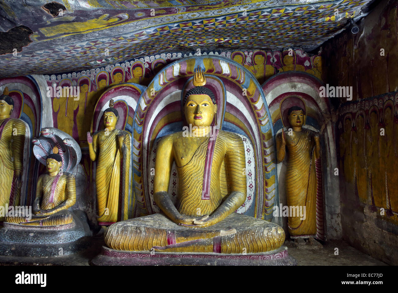 Ancient Buddha statues inside Dambulla Rock Temple in Sri Lanka Stock Photo