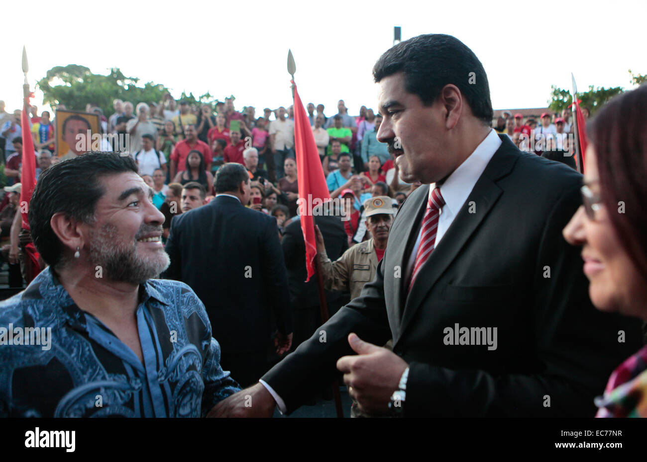 Caracas, Venezuela. 9th Dec, 2014. Image provided by Venezuela's Presidency shows Venezuelan President Nicolas Maduro (R) greeting former Argentine soccer Player Diego Armando Maradona during a ceremony marking the 190th anniversary of the Battle of Ayacucho, at the National Pantheon in Caracas, Venezuela, on Dec. 9, 2014. © Venezuela's Presidency/Xinhua/Alamy Live News Stock Photo