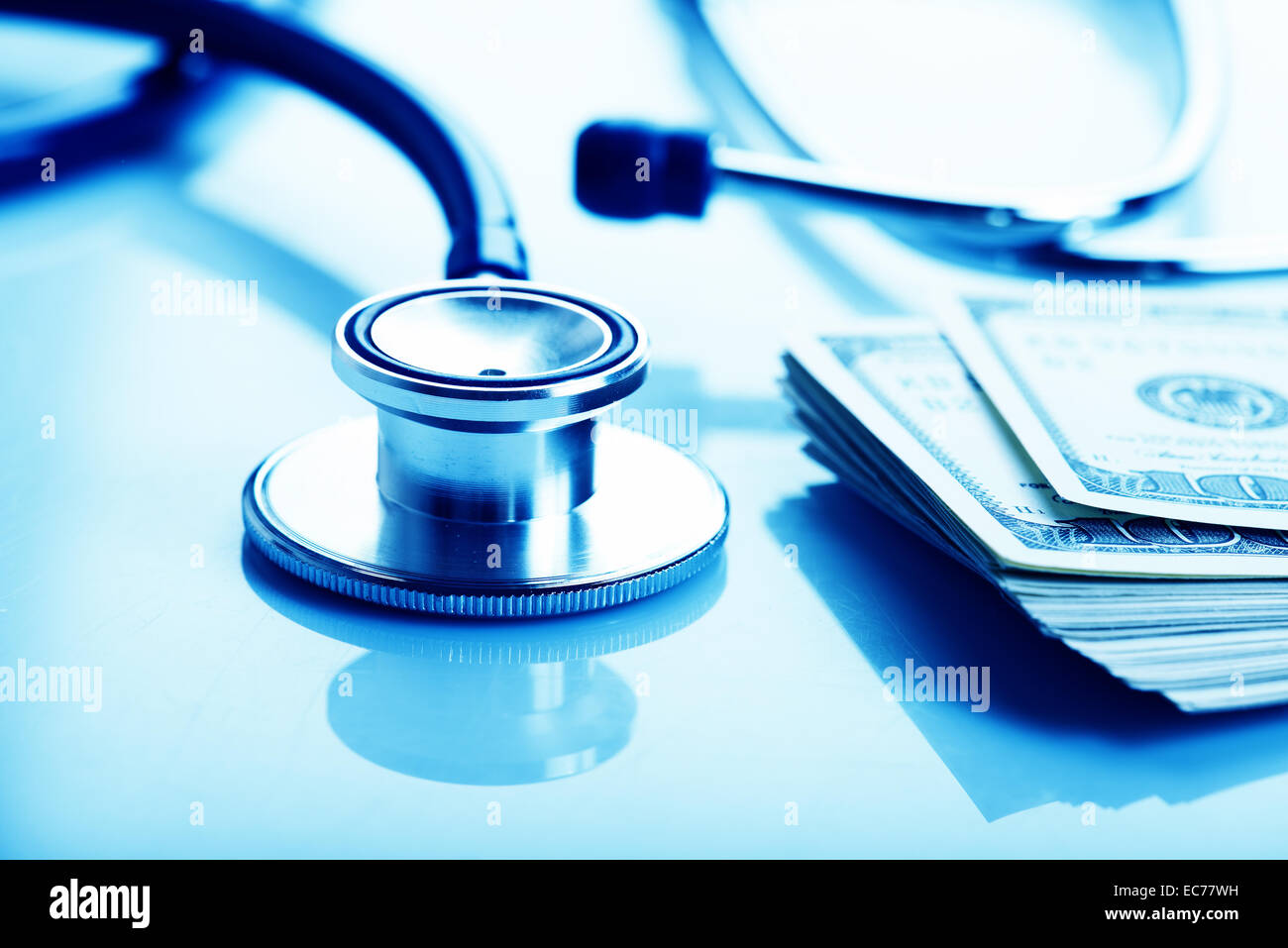 Healthcare cost concept stethoscope and dollars Stock Photo Alamy