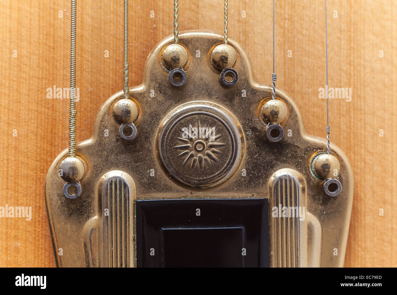 Part of a gipsy guitar, old fashioned acoustic guitar in macro view. Stock Photo