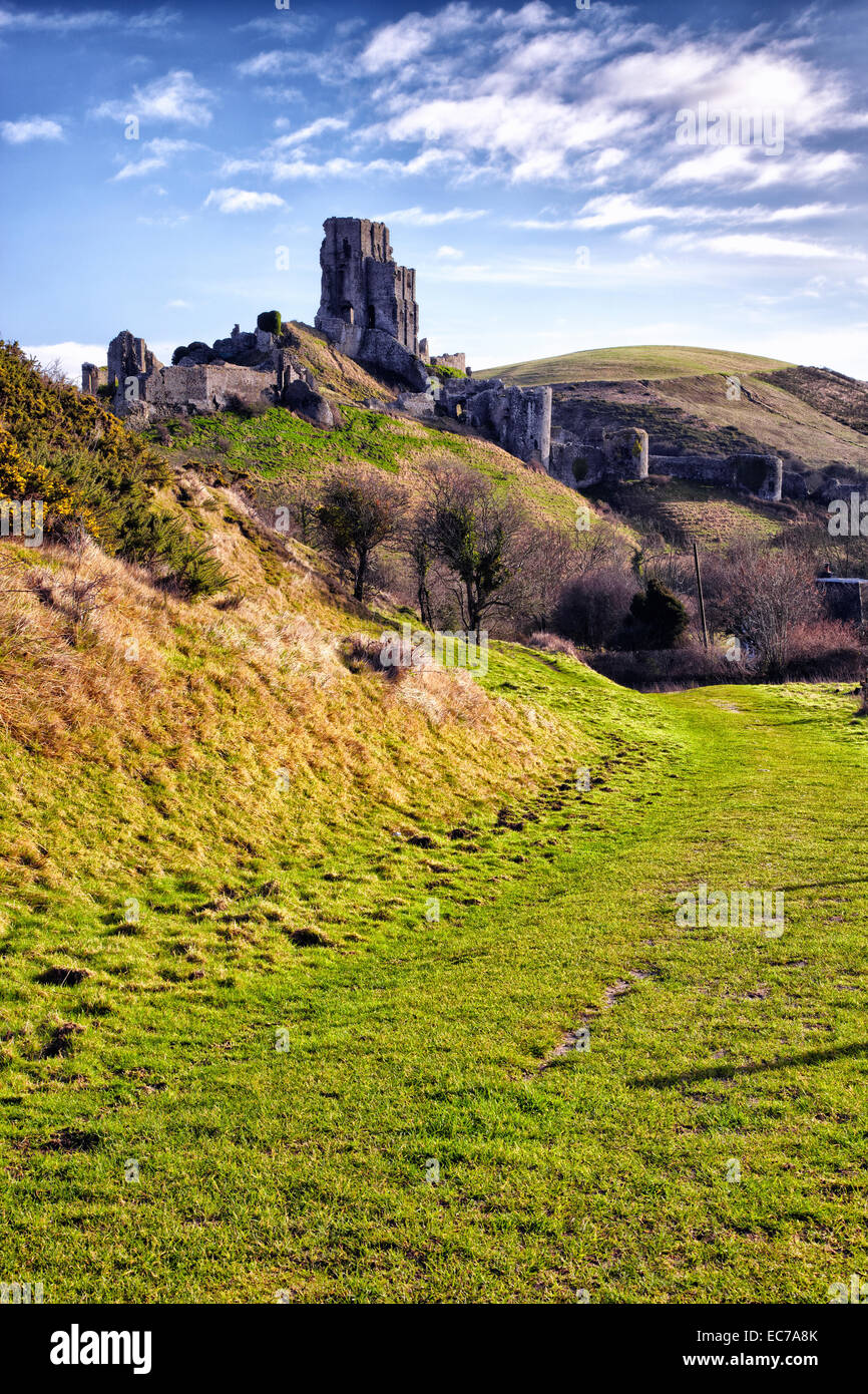 The ruin of Corfe Castle dominates the Dorset landscape Stock Photo