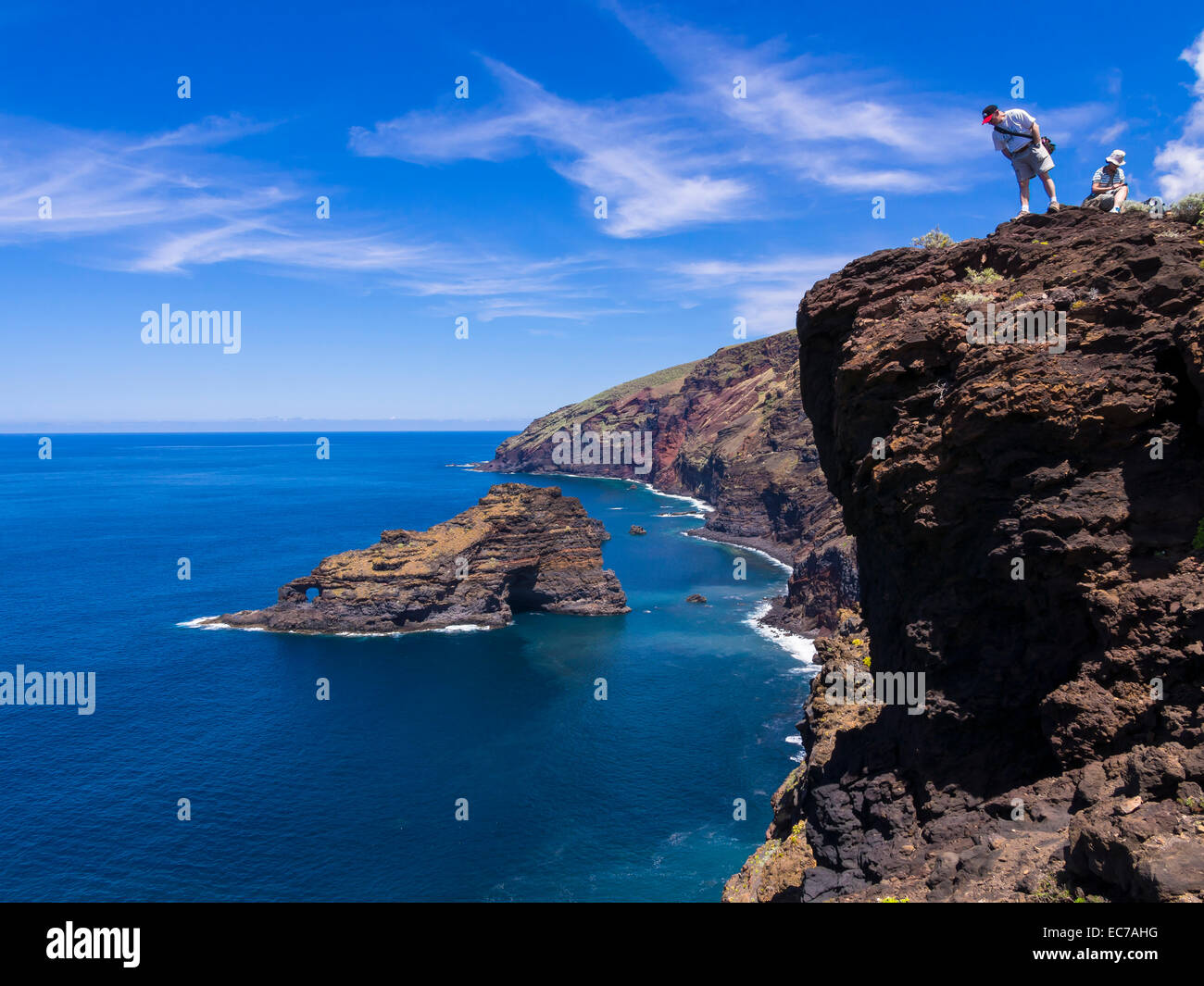 Spain, Canary Islands, La Palma, tourists at the cliff coast of Garafia Stock Photo