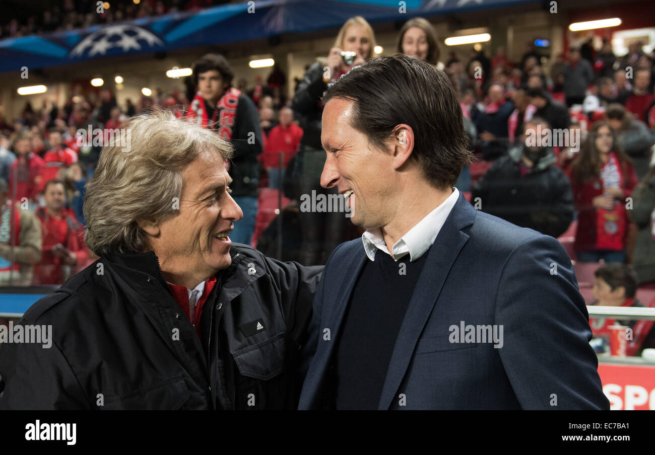 Leverkusen's head coach Roger Schmidt, center right, embraces Leverkusen's  Tin Jedvaj after the Champions League group C soccer match between Bayer 04  Leverkusen and Zenit in Leverkusen, Germany, Wednesday, Oct. 22, 2014.(AP