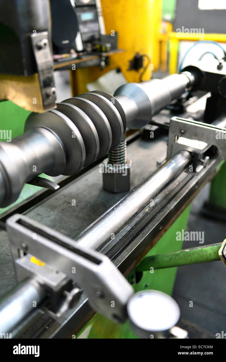 Engineering shaft in a hardening shop Stock Photo Alamy
