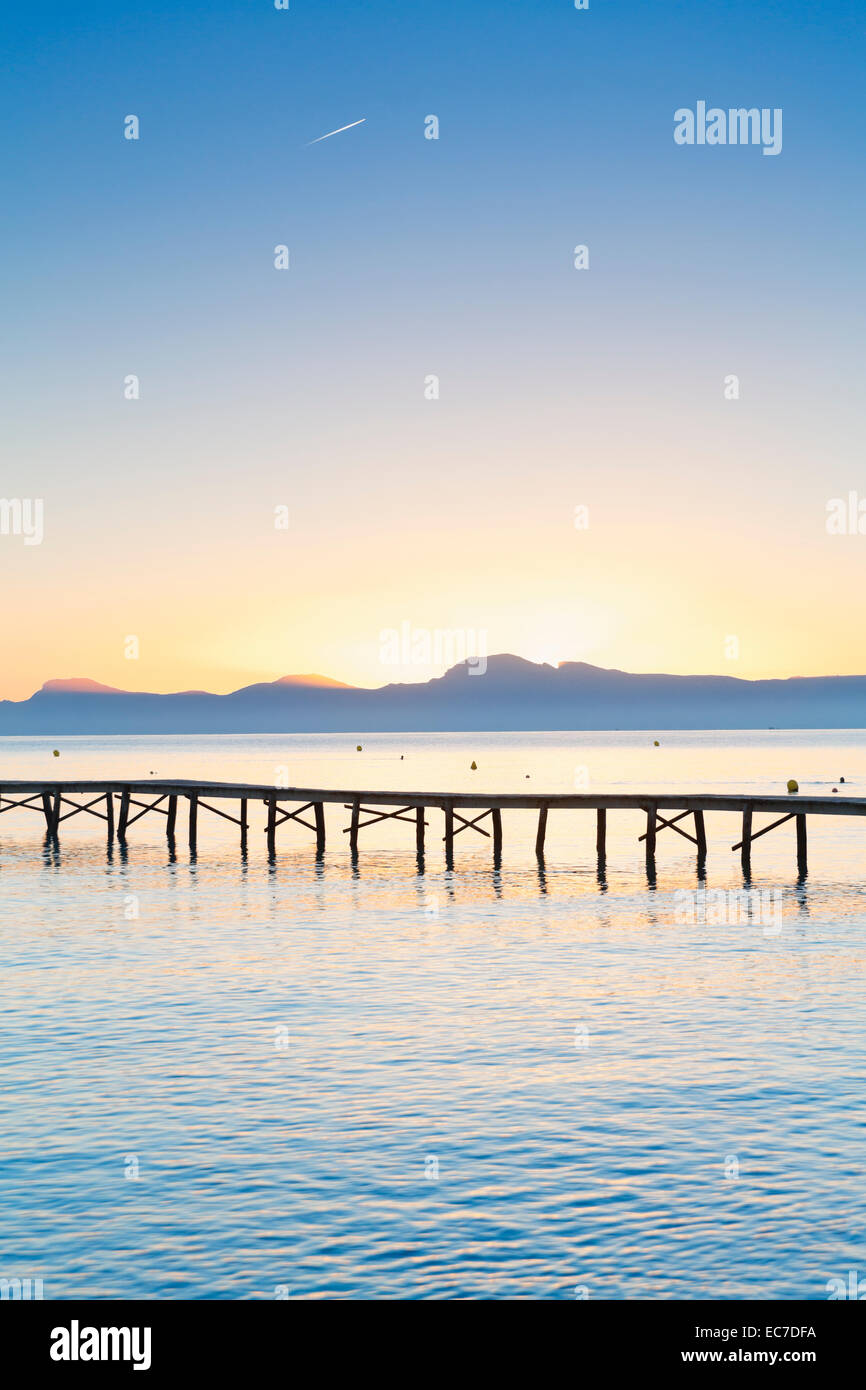 Spain, Balearic Islands, Majorca, Jetty at sunrise Stock Photo