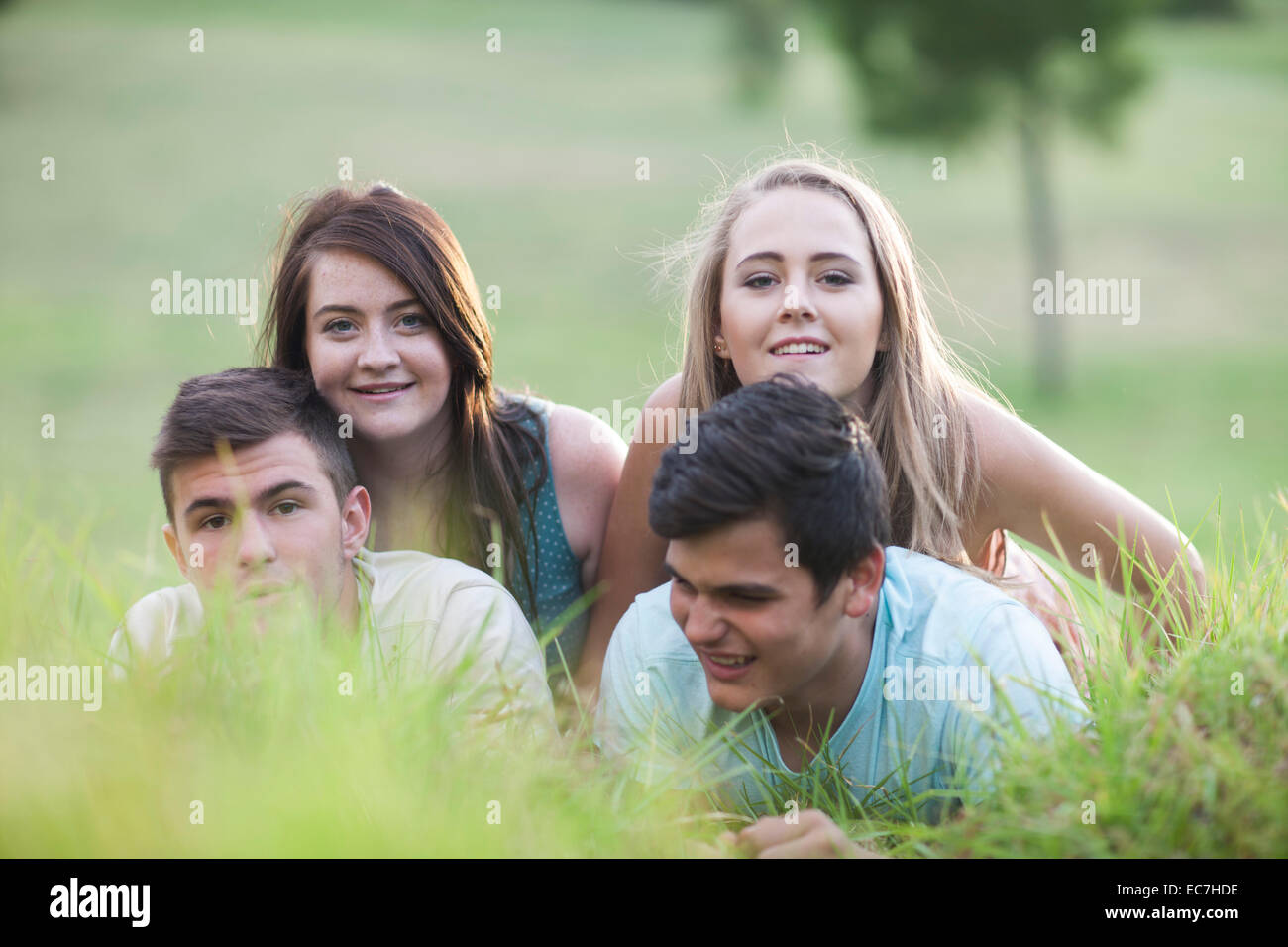 Two teenage couple on a meadow Stock Photo