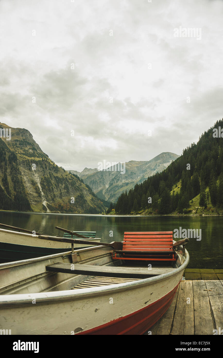 Austria, Tyrol, Tannheimer Tal, boats at mountain lake Stock Photo